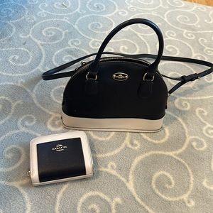 Coach purse and matching wallet black and white cross body